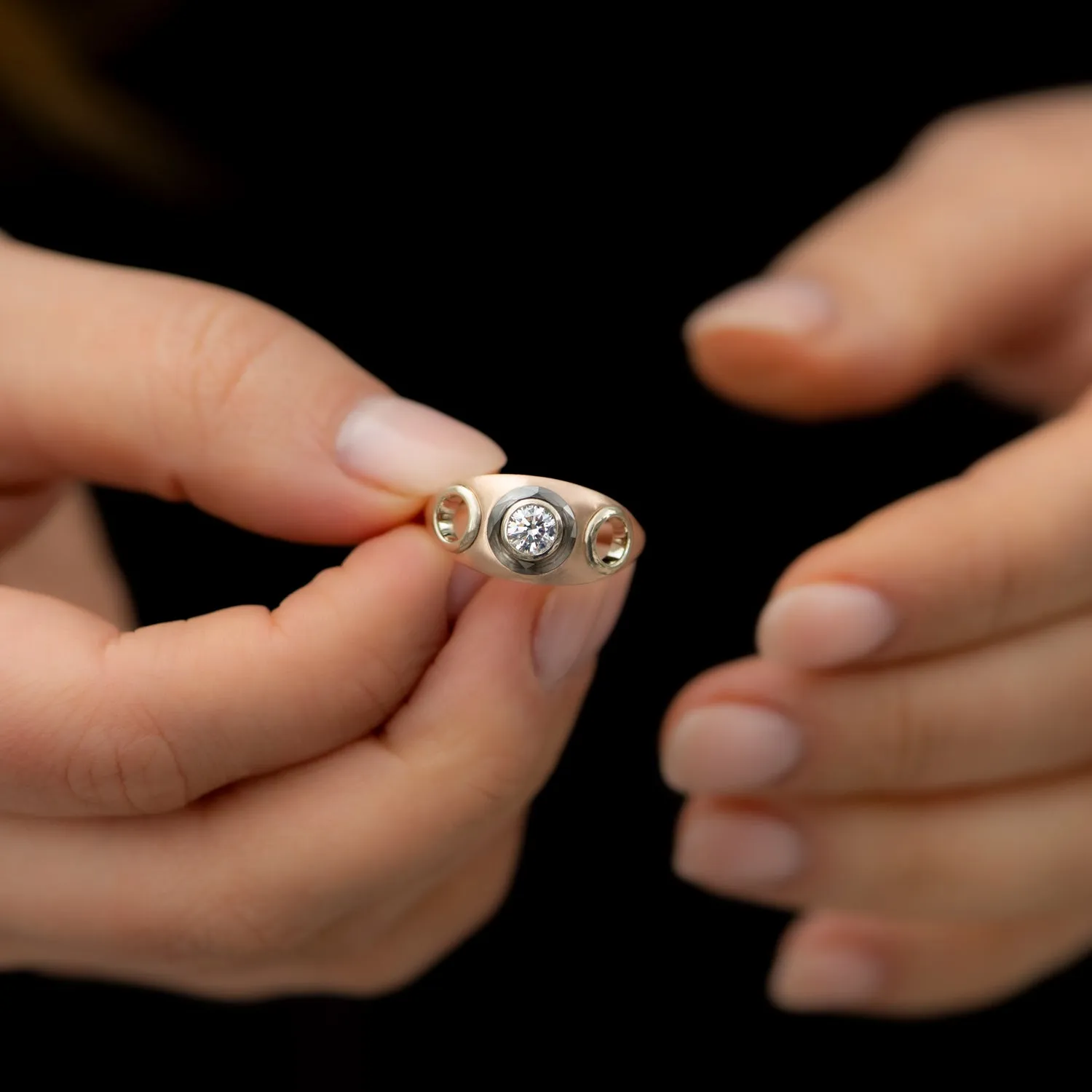 Piercing Engagement Ring with Grommets and a Grey Diamond Halo