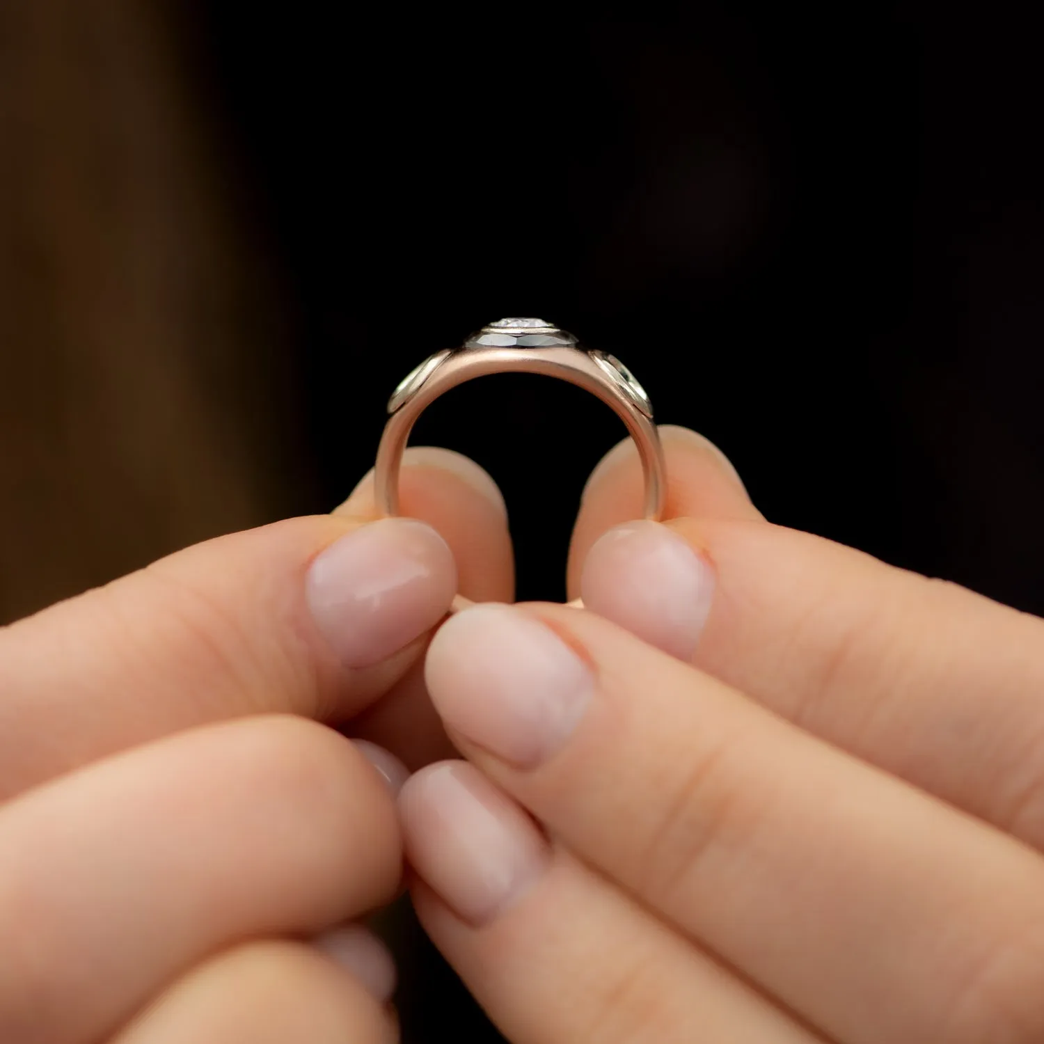 Piercing Engagement Ring with Grommets and a Grey Diamond Halo